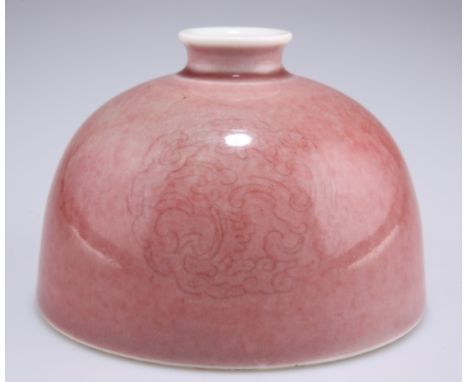 A CHINESE "PEACH BLOOM" PORCELAIN BRUSH WASHER, bears Kangxi mark but probably 19th/20th Century, of beehive form. 9cm high
