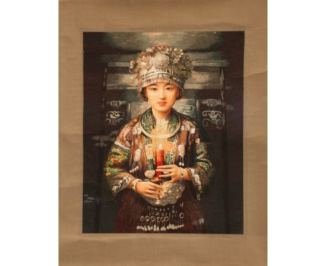 A CHINESE HAND-EMBROIDERED SILK PICTURE, 20TH CENTURY, depicting a lady holding a candle, mounted on to a scroll. Image 72cm 