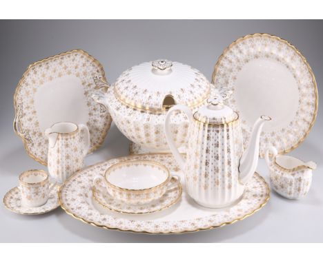 AN EXTENSIVE SPODE FLEUR-DE-LYS GILDED CHINA TEA, COFFEE AND DINNER SERVICE, for eight settings, comprising teapot, tea cups 