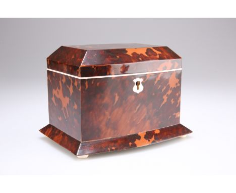 A SMALL FAUX TORTOISESHELL TEA CADDY, IN GEORGIAN STYLE, bow-fronted, with hinged cover and twin lidded compartments. 15cm lo