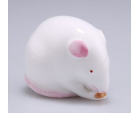 A ROYAL WORCESTER NETSUKE, in the form of a mouse, green printed factory mark, date code indistinct. 3.4cm highCONDITION REPO