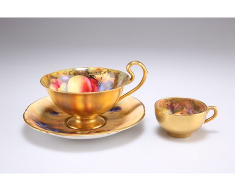 A ROYAL WORCESTER FRUIT PAINTED CUP AND SAUCER, the cup signed by W.H. Austin, with gilded exterior; together with A SMALL RO