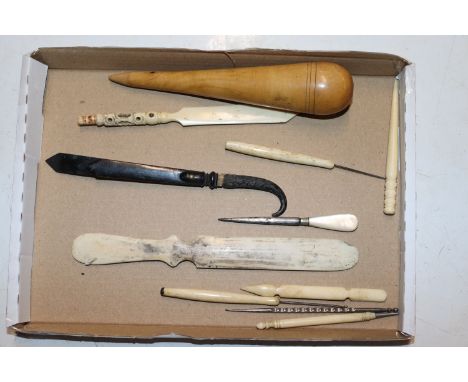 A box of antique sewing tools to include bone paper knife with stanhope viewer 