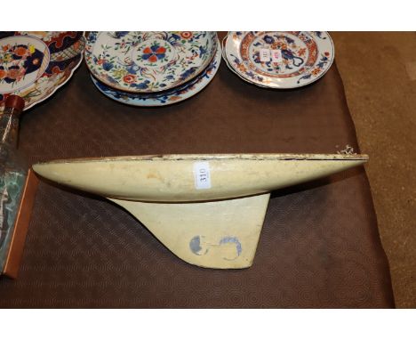 A vintage pond yacht hull