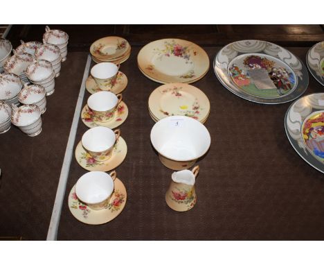 A quantity of Royal Worcester blush ivory tea ware, puce mark to the underside 