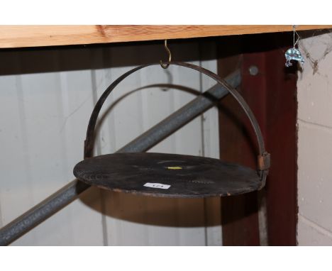 A vintage iron griddle 