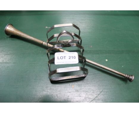 A hallmarked silver toast rack, together with a silver candle snuffer in the form of a coaching horn 