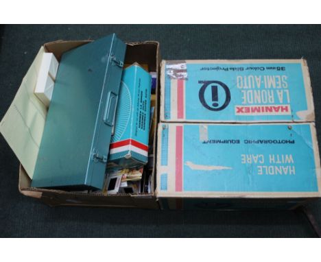 A selection of slides and a boxed Hanimix projector 