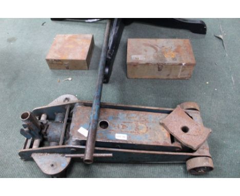 A large manual pneumatic car jack, together with a series of pulleys 