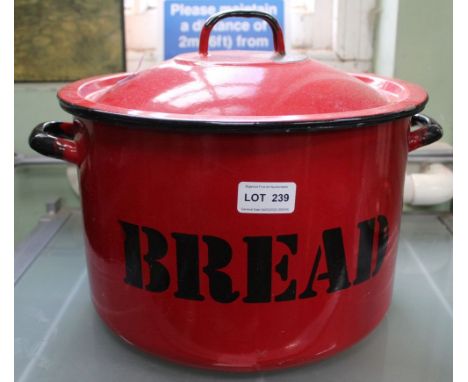 A red enamel bread crock and lid 