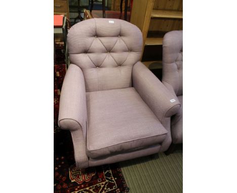 A lavender upholstered button backed Laura Ashley branded deep-seated armchair, show wood legs 