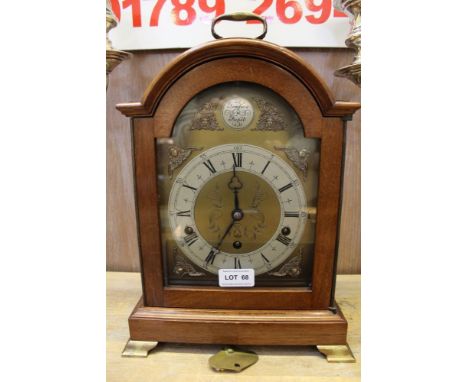 A 20th century mahogany cased Elliott's of London bracket design Mantel clock, chiming movement, complete with key 
