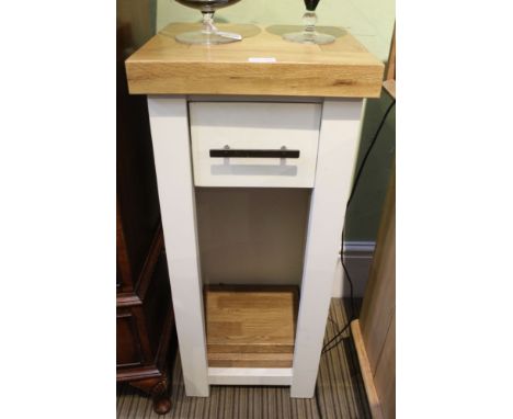 A modern oak block topped lamp table, fitted with a single drawer on painted base with adjustable shelf recess 