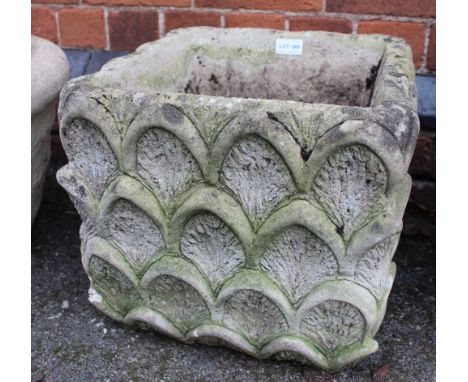 A cast square formed garden planter 