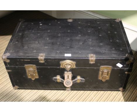 A brass bound steamer trunk 