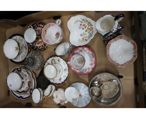 A box containing collectors cups and saucers, a silverplated Pink Rose branded cream and sugar, etc. 