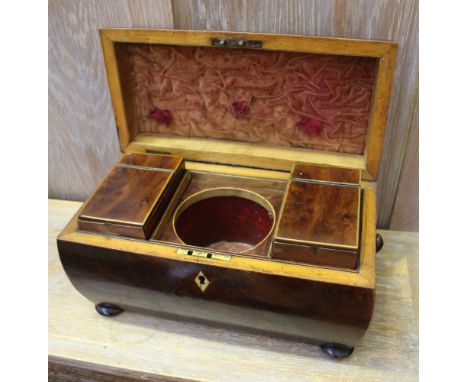 A 19th-century sarcofagus formed tea caddy of typical form and construction 