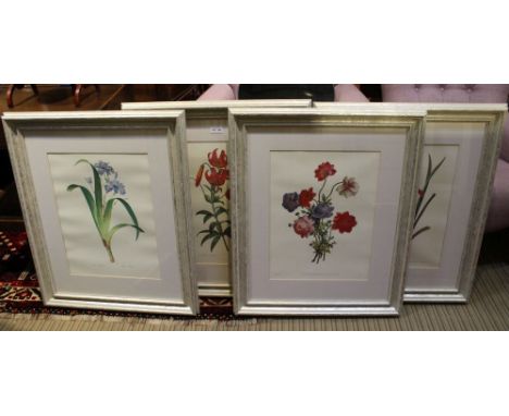 A set of four large decorative floral prints plain mounted in distressed silver metallic frames 