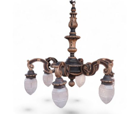 Baroque design carved wood and parcel gilt chandelier, the turned stem carved with curled acanthus leaves, the underbelly dec