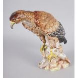 A German china model of an eagle, 7 1/2" high