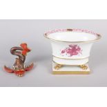 A Herend menu card holder, formed as a dolphin with gilt decoration, 3" high, and a Herend oval bowl