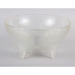An R Lalique "Lys" pattern opalescent glass bowl, on four raised feet, 9 1/2" dia (chip)