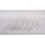 A set of six 19th century conical wines, engraved with dragons and monogram faceted knop stems,