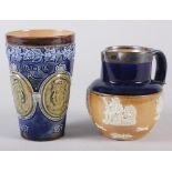 A Doulton Stoneware 1897 Jubilee beaker, 5" high, and a Doulton silver mounted stoneware hunting