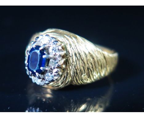 An 18ct Gold, Sapphire and Diamond Ring, size M.5, 5.4 g