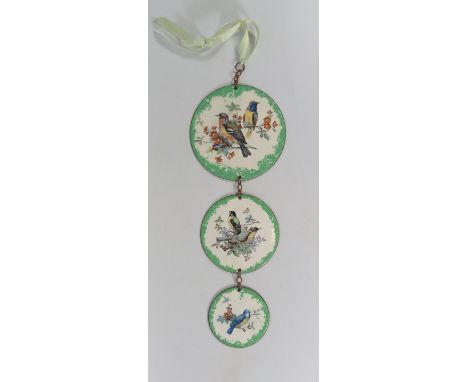 A Set of Three Enamel Roundels decorated with birds, 30 cm drop
