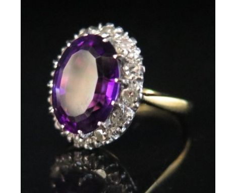 An 18ct Gold, Amethyst and Diamond Ring, size J.5, 4.7 g