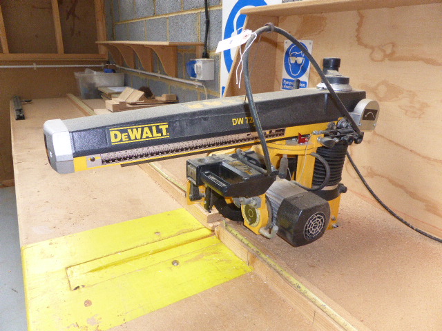 Dewalt Model DW720 crosscut saw on bench single phase