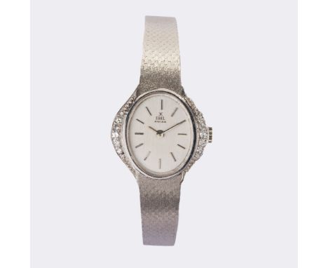 Ebel. Damen-Armbanduhr mit Diamanten. 18 kt. WG, gest., Handaufzug. Silberfarbenes Zifferblatt, Zeiger und Indizes, bez. 'Ebe