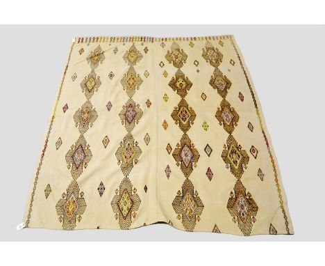 Four Anatolian cream and beige ground embroidered flatweaves, all modern, the first, with four rows of medallions, 7ft. x 6ft