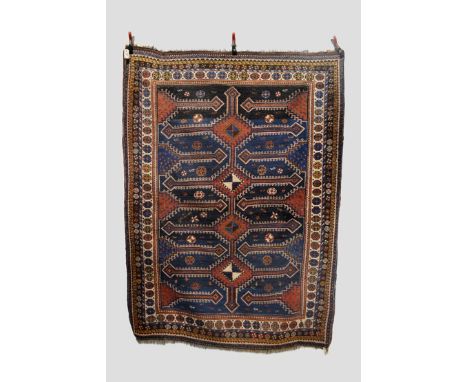 Luri rug, Fars, south west Persia, early 20th century, 7ft. 11in. x 5ft. 10in. 2.41m. x 1.78m. Patch to motif in lower right 