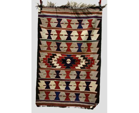 Four Anatolian kelims, all modern, comprising: the first two of matching banded medallion design, 5ft. x 3ft. 4in. 1.52m. x 1
