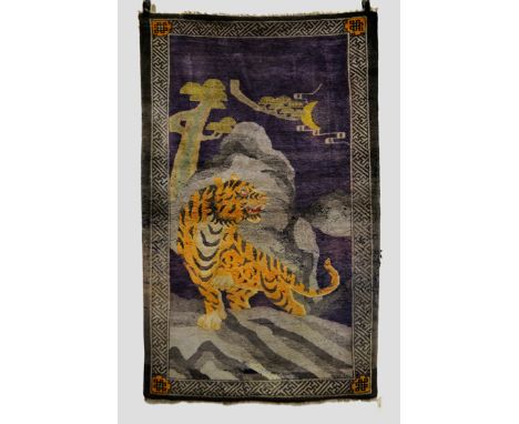 ‘The Look-Out Cat in the Night-time’. Baotou ‘tiger’ rug, north west China first quarter 20th century, 6ft. x 3ft. 9in. 1.83m