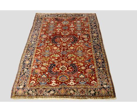 Heriz carpet of all over design, north west Persia, circa 1930s-40s, 10ft. 6in. x 7ft. 5in. 3.20m. x 2.26m. Small hole to rig