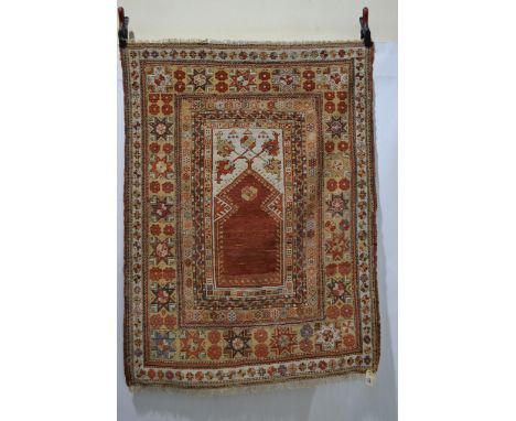 Exceptional Melas prayer rug, west Anatolia, first half 19th century, 4ft. 11in. x 3ft. 8in. 1.50m. x 1.12m. Overall even wea