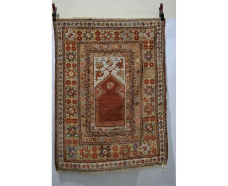 Exceptional Melas prayer rug, west Anatolia, first half 19th century, 4ft. 11in. x 3ft. 8in. 1.50m. x 1.12m. Overall even wea