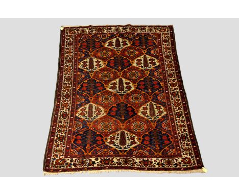 Bakhtiari carpet, Chahar Mahal carpet, south west Persia, circa 1930s, 7ft. 5in. x 5ft. 9in. 2.26m. x 1.75m. Overall wear. 