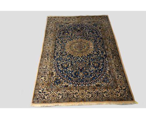 Nain part silk carpet with pale blue field, central Persia, mid-20th century, 9ft. 7in. x 6ft. 5in. 2.92m. x 1.96m. 