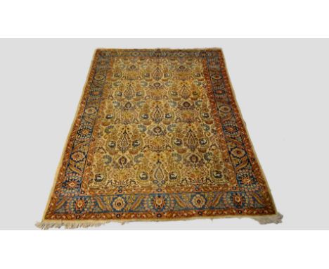 Tabriz ivory field carpet, north west Persia, circa 1930s, 10ft. 6in. x 7ft. 6in. 3.20m. x 2.29m. Hole to top end centre fiel