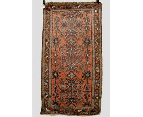 Hamadan rug, north west Persia, circa 1930s, 6ft. 5in. x 3ft. 5in. 1.96m. x 1.04m. Slight wear and moth damage; dark brown su