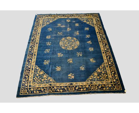 Chinese carpet, Baotou-Suiyuan, north west China, about 1920s-30s, 11ft. 2in. x 8ft. 8in. 3.40m. x 2.64m. Overall wear, heavi