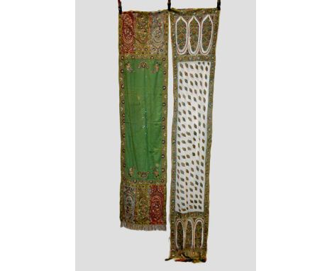 Two Indian stoles, both late 19th century, exquisitely embroidered in floss silks in vibrant colours: The first net ground, t