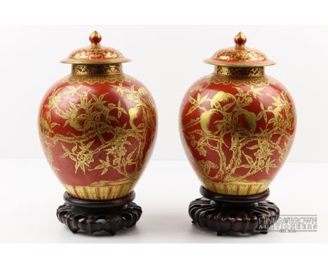 A very fine pair of coral ground gilt decorated Chinese porcelain vases & covers, probably Republic period, each of ovoid for