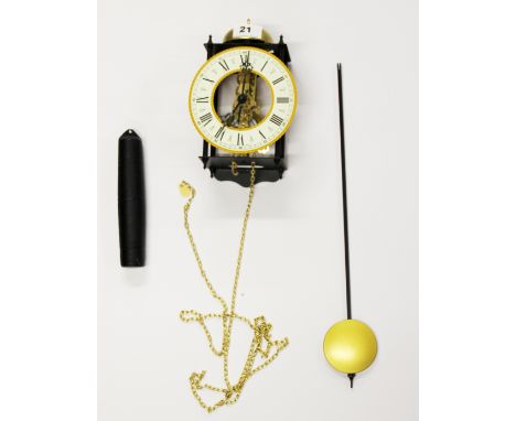 A German skeleton wall clock, 20cm.