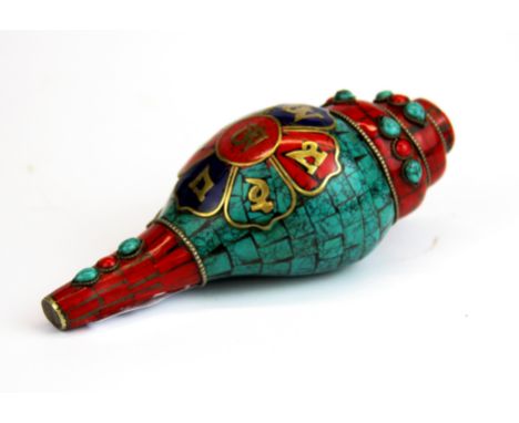 A Tibetan mosaic decorated conch shell trumpet. Conch shell L. 15cm.