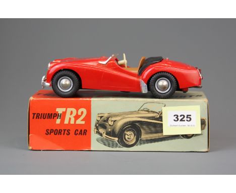 A Victory Industries boxed Triumph TR2 model sports car.